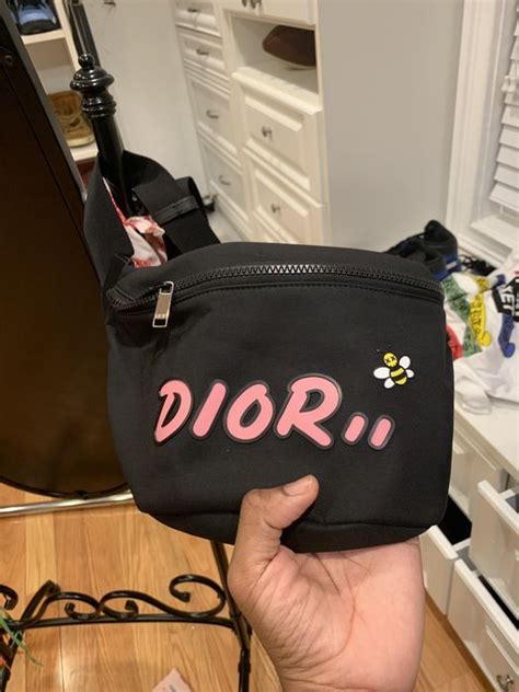 dior x kaws belt bag|DIOR x KAWS Black Nylon Pouch with Blue Dior logo.